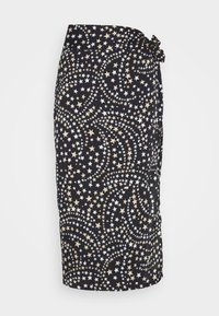 Jupe noire avec un motif d'étoiles en or et blanc, dotée d'un lien à la taille. Le tissu semble lisse avec une silhouette ajustée.