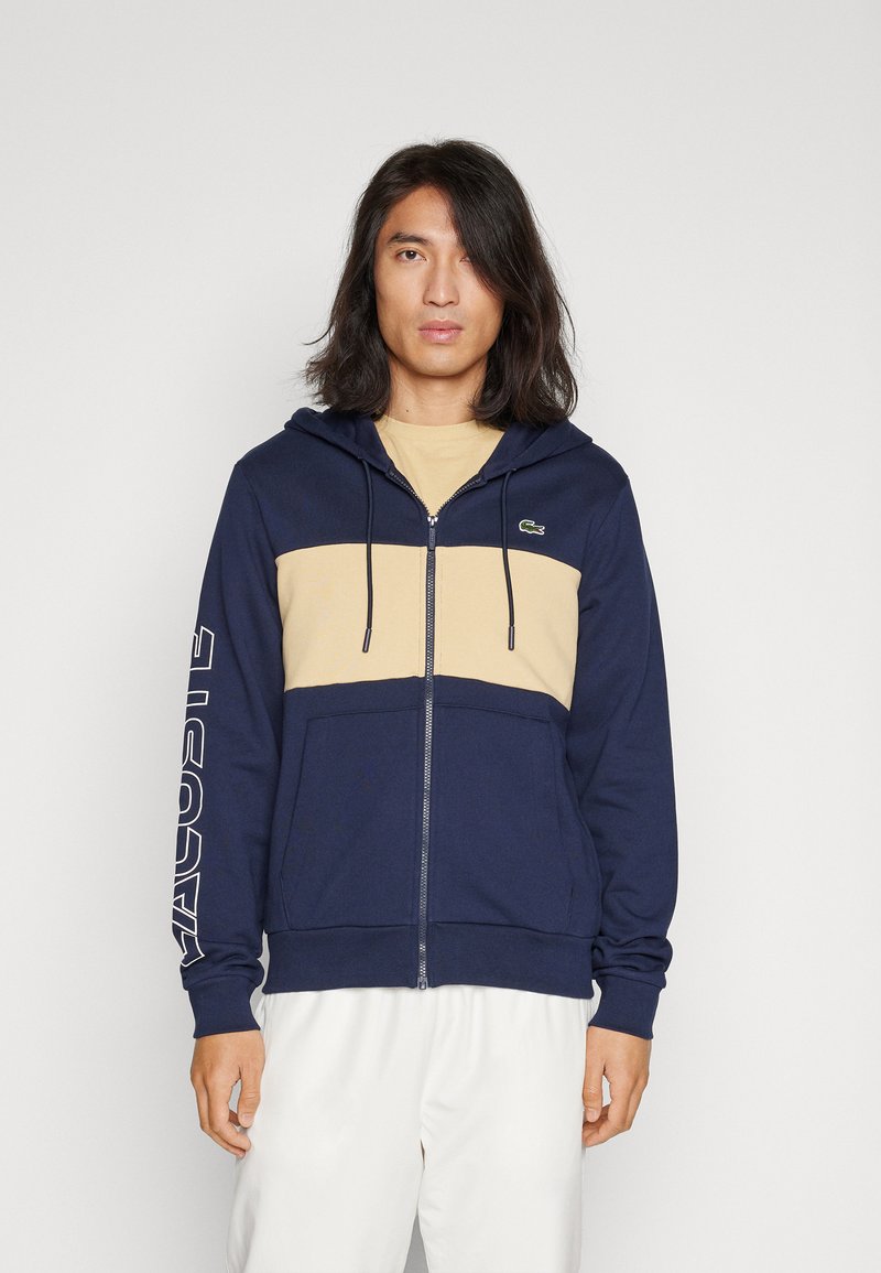 Lacoste - ZIPPED COLOURBLOCK HOODIE UNISEX - Majica s kapuljačom i patentnim zatvaračem - navy blue/croissant, Povećaj