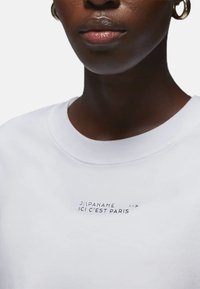 Nike Performance W JORDAN X PARIS ST GERMAIN BOXY GFX  - Klubové oblečení - weiss