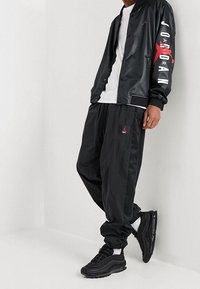 Jordan Träningsbyxor - black