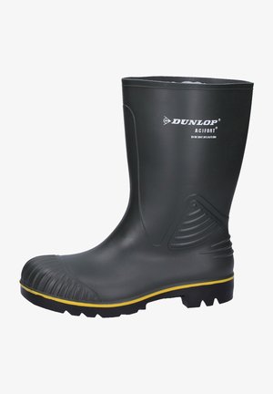 Black rubber waterproof boot with a textured toe, yellow outsole, and a logo on the upper shaft. Designed for durability and traction.