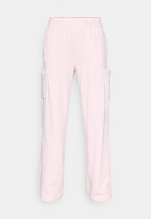 Light pink sweatpants with an elastic waistband, two side pockets, and a relaxed fit; made from soft, textured fabric.