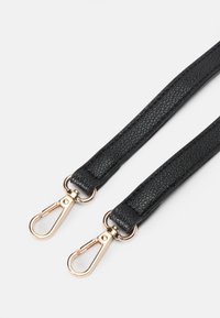 Black leather strap featuring a textured finish and gold-tone metal clips at each end for secure attachment.