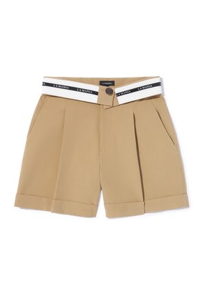 Beige hochgeschnittene Hose mit vorderer Falte und sichtbarem Bund, der das "LA MANIA"-Logo auf einem schwarz-weißen Streifen zeigt.