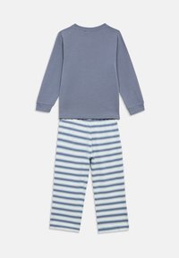 Children's two-piece pajama set with solid blue long-sleeve top and light blue, white, and gray horizontal striped pants.