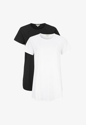 Kaksi lyhythihaista t-paitaa mustana ja valkoisena, valmistettu puuvillasta, joissa on pyöreä kaula-aukko ja raglan-hihat rentoa istuvuutta varten.