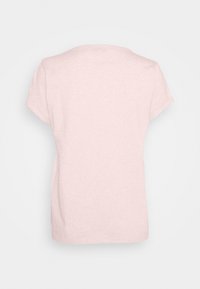 Světle růžové tričko s krátkým rukávem, kulatým výstřihem a volným střihem. Jemná tkanina z bavlněného směsového materiálu s hladkým povrchem.