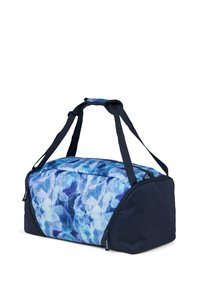 Borsa a duffle con un motivo astratto blu sul davanti, lati blu scuro, due manici robusti e aperture con doppia cerniera.