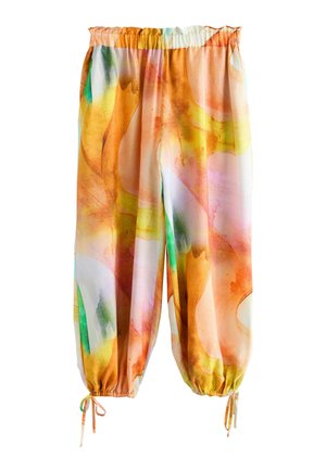 Volné kalhoty s elastickým pasem a manžetami, s abstraktním akvarelovým vzorem v oranžových, žlutých, zelených a růžových tónech.