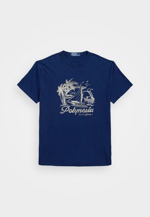 Navy blue cotton t-shirt featuring a white graphic of palm trees, a sailboat, and the word "Polynesia" in a retro font. Short sleeves.