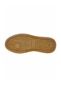 Semelle d'une chaussure, en caoutchouc beige. Présente une surface texturée avec des motifs en chevron, des accents circulaires et rectangulaires, ainsi que des grips surélevés.