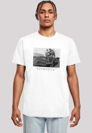 White T-shirt featuring a black and white graphic of the Batmobile with two figures. The design includes the text "BATMOBILE" below the image.