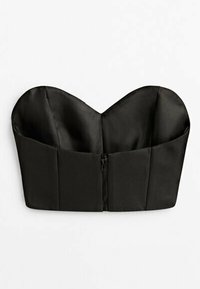 Haut bandeau noir sans bretelles avec décolleté en forme de cœur et fermeture éclair à l'avant, en tissu lisse.