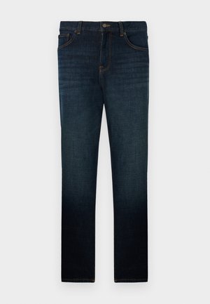 Tmavomodré slim-fit džínsy s prednými vreckami, zapínaním na gombík a jemným vyblednutím na stehnách a nohách.