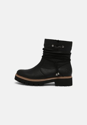 Rieker Bottines à plateau - schwarz