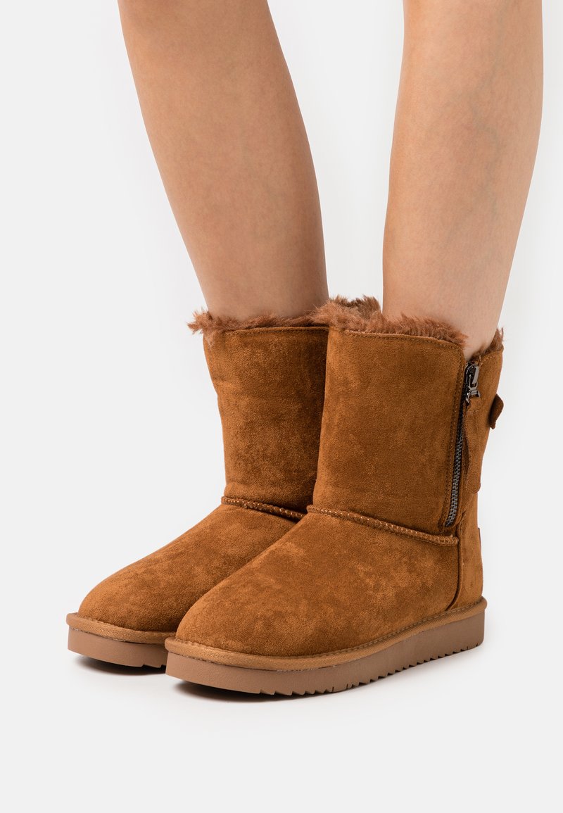 bottes xti camel