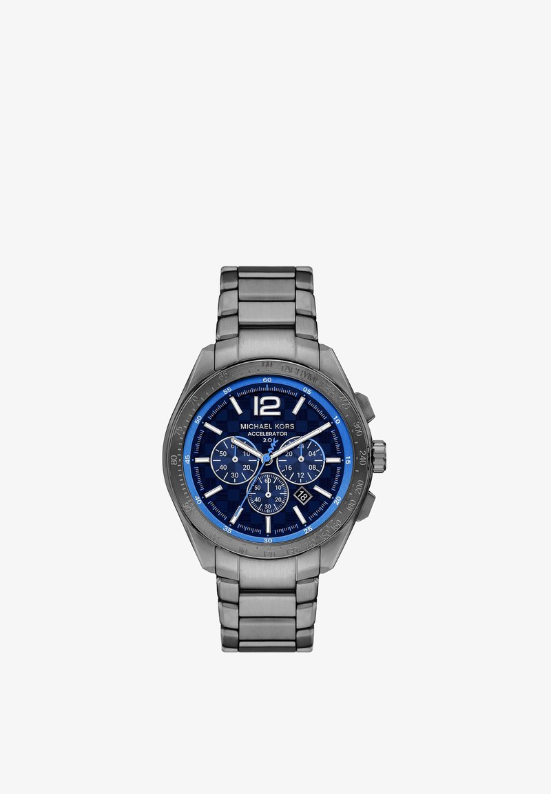 Reloj Michael Kors con pulsera de acero inoxidable, esfera a cuadros azules, acentos plateados y funciones de cronógrafo. Diseño de caja octagonal.
