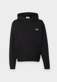 Sweat à capuche noir avec poche avant et logo blanc « bareen » sur la poitrine, présenté sur un fond gris.