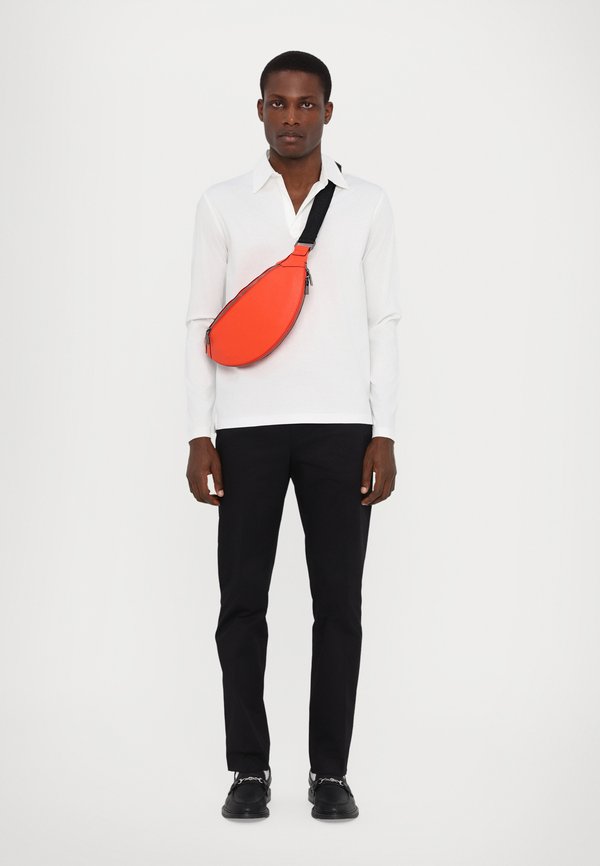 ORIGAMI UNISEX - Cross body bag - vivid orange