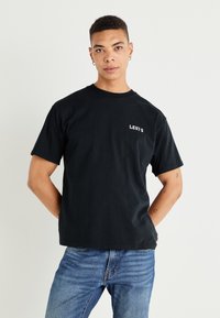 Levi's® VINTAGE FIT GRAPHIC - Nyomott mintás póló - black