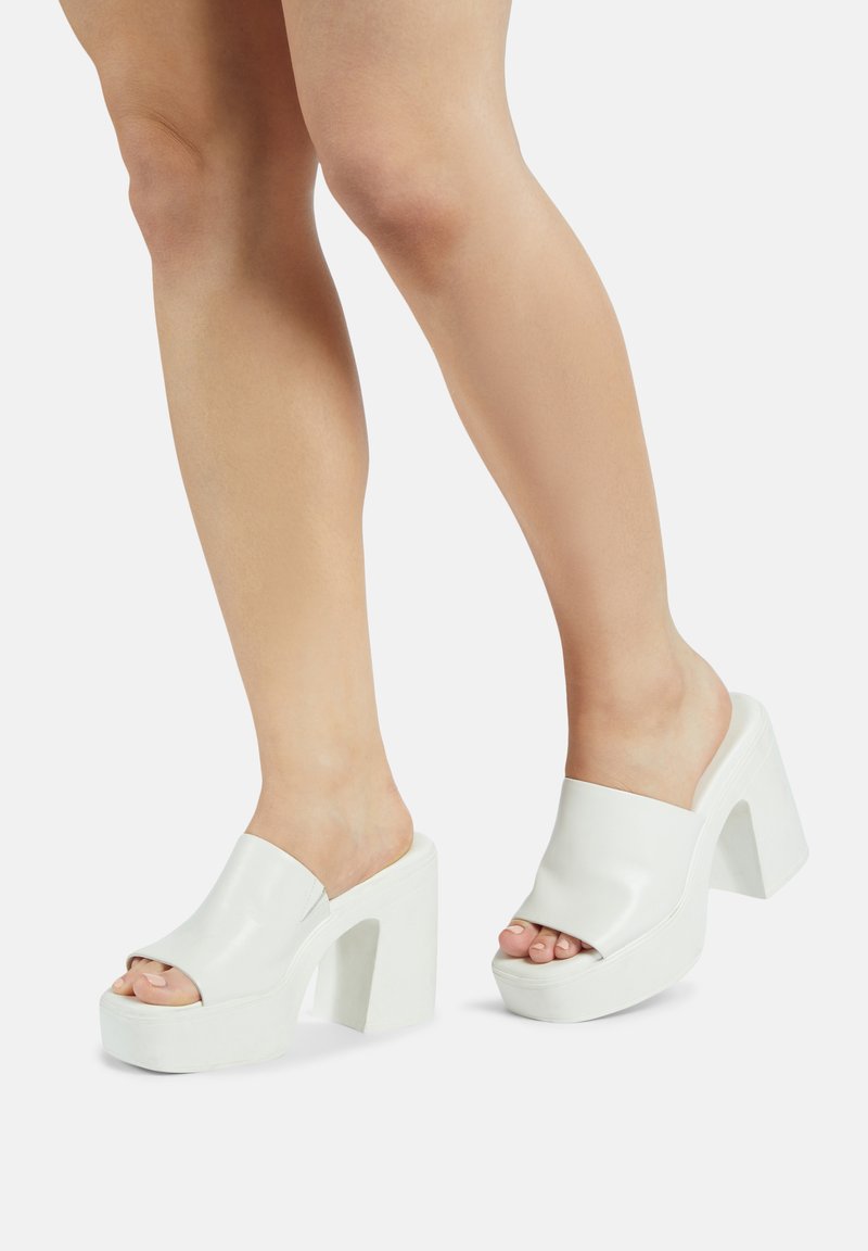 aldo white mules
