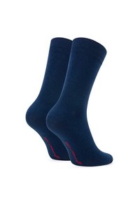 Granatowe bawełniane skarpetki z prążkowanym ściągaczem i gładką teksturą. Charakteryzują się dyskretnym czerwonym logo na kostce. Zaprojektowane z myślą o komforcie i dopasowaniu.