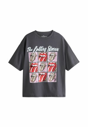 Gray oversized t-shirt made of cotton, featuring a graphic print of red lips and iconic logos in nine squares, outlined in pink.