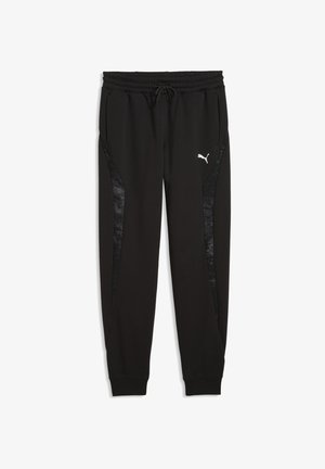 Schwarze Puma Jogginghose mit elastischem Bund, Kordelzug, Seitentaschen, gerippten Bündchen und dunklen gemusterten Seitenteilen. Puma-Logo auf dem linken Oberschenkel.