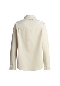 Crème-kleurige knoopshirt met lange mouwen, met een textuurstof, een achterplooitje en een logo nabij de kraag.