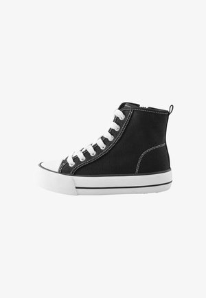 Black high-top sneakers made of canvas, featuring white laces, a rubber toe cap, a white midsole with black accents, and contrasting stitching.