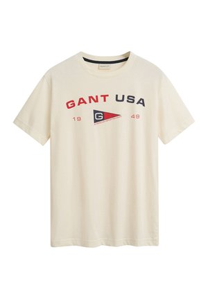 Kremowa bawełniana koszulka z krótkim rękawem z napisem "GANT USA" w różnych kolorach, trójkątnym logo i rokiem założenia "1949". Klasyczny krój z okrągłym dekoltem.