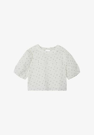 Valge lühikeste varrukatega pluus, millel on väiksed sinised lillemustrid, avara kaelusega ja lõdva istuvusega, valmistatud kergest kangast tekstuursete detailidega.