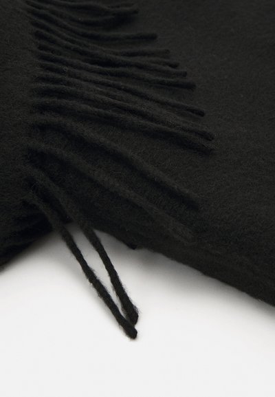 Black wool scarf with fringed edges, featuring a soft texture and a uniform color. The fringe measures approximately 3 inches in length.