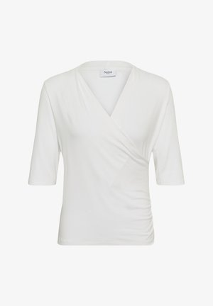 Weiße Wickelbluse mit Ellbogen-langen Ärmeln und dezenten Seitenraffungen, mit V-Ausschnitt und einem "Saint Tropez"-Etikett.