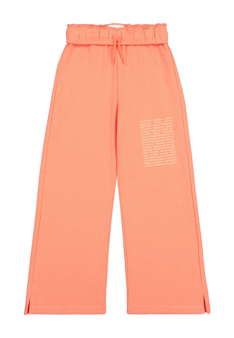 Pantaloni della tuta rosa con gambe larghe, vita elasticizzata e coulisse. Presentano un dettaglio di testo stampato bianco sul lato sinistro. Materiale misto cotone.