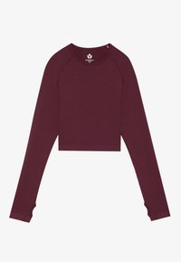 Burgundia värvi lühikeste käistega pikem topp, millel on sooniline tekstuur ja käiste aukudega aktsendid. Valmistatud pehmest ja venivast materjalist.