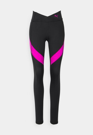 Leggings atléticos negros con una cintura alta que presentan paneles diagonales en magenta a los lados. Fabricados con un material elástico y suave.