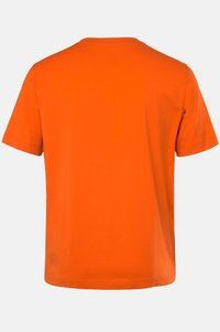 T-shirt à manches courtes, col rond en tissu coton orange vif. Le dos est uni avec une texture lisse et sans graphiques ni embellissements visibles.