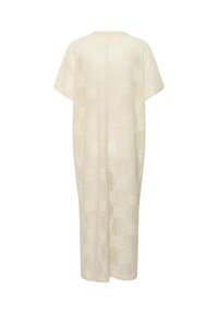 Robe longue crème en crochet tricoté avec manches courtes et silhouette droite et ample.