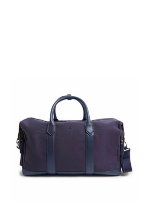 Bolsa de deporte de tela azul oscuro con asas de cuero, detalles en cuero y una correa de hombro desmontable sobre un fondo blanco.