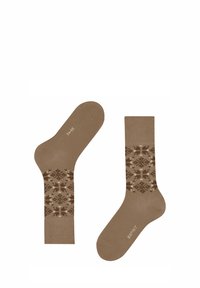 Chaussettes brunes à motif géométrique dans des teintes plus foncées. Fabriquées en matériau doux, avec une texture lisse et un renfort au niveau des orteils.