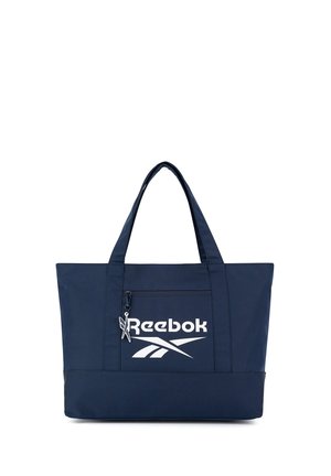 Borsa tote Reebok blu navy con doppi manici, tasca frontale con zip e logo Reebok bianco sul pannello frontale.