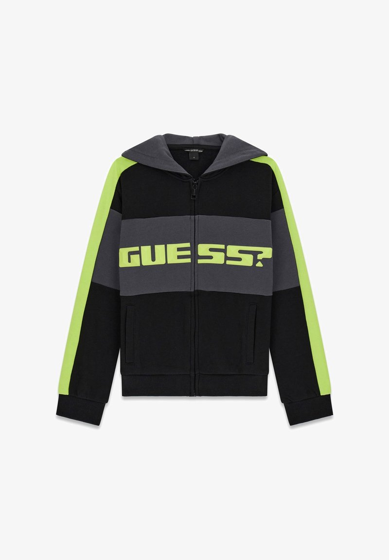 Black zip-up hoodie featuring gray and neon green stripes, large "GUESS?" logo across the chest, and a drawstring hood. Soft fabric texture.