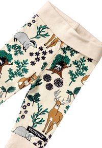Cotton leggings featuring a beige base with a wildlife pattern, including deer, foxes, and plants. Soft waistband, VILLERVALLA label visible.