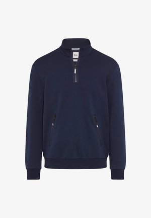 Pullover blu navy con colletto a metà zip, realizzato in tessuto morbido. Presenta due tasche frontali con zip e polsini a coste. Design semplice e pulito.