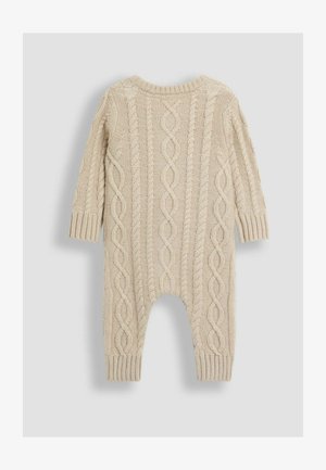 Bežni pleteni kombinezon s kabelskim vzorcem, dolgimi rokavi, rebrastimi manšetami in zaobljenim vratnim izrezom. Mehak material in sproščen kroj.