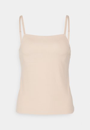 Svijetlo bež top s podešavanim tankim trakama, glatke teksture i jednostavnog dizajna. Ravni rub bez vidljivih uzoraka ili ukrasa.