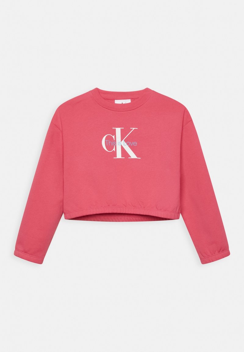 Różowy krótki sweatshirt z bawełny, z długimi rękawami, z dużym białym logo "CK" oraz napisem "This is Love" w kolorze niebieskim.