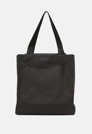 Sac cabas rectangulaire noir avec double anses et une poche zippée à l'avant, présenté sur un fond clair uni.