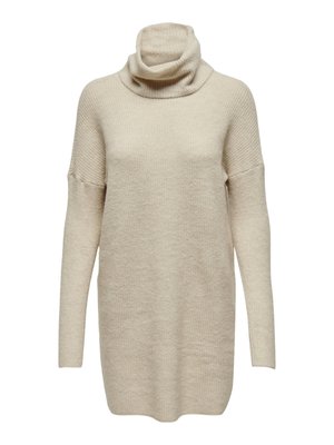 Beige turtleneck sweater with a loose fit, long sleeves, ribbed texture, and drop shoulders, made from a soft knit fabric.